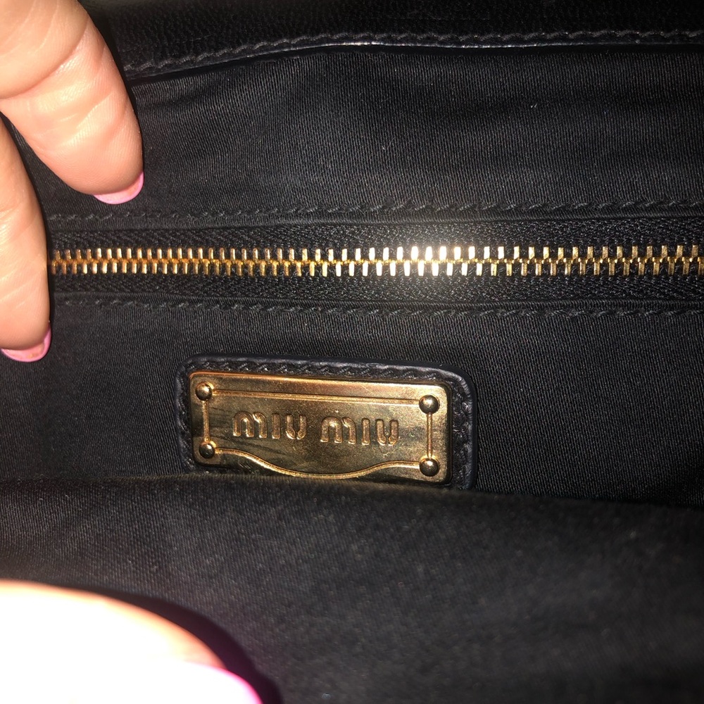Miu Miu Black Clutch with Gold-Tone Plaque